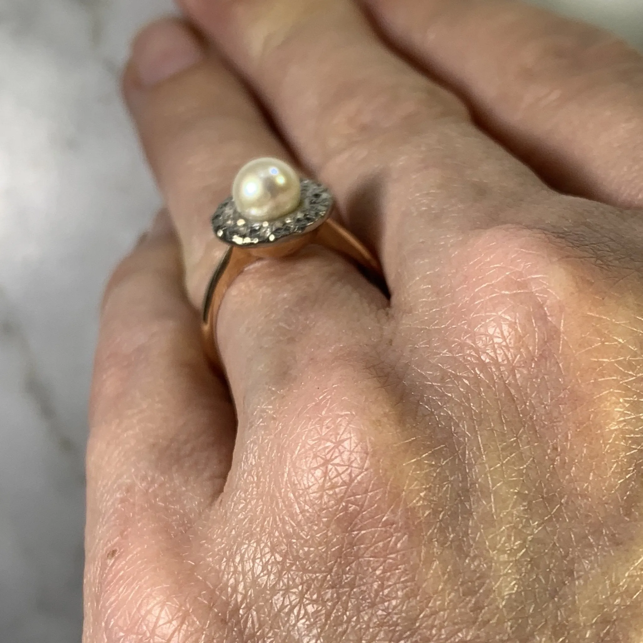 1940s Pearl Engagement Ring set in 14K White and Rose Gold. Sustainable Estate Jewelry.