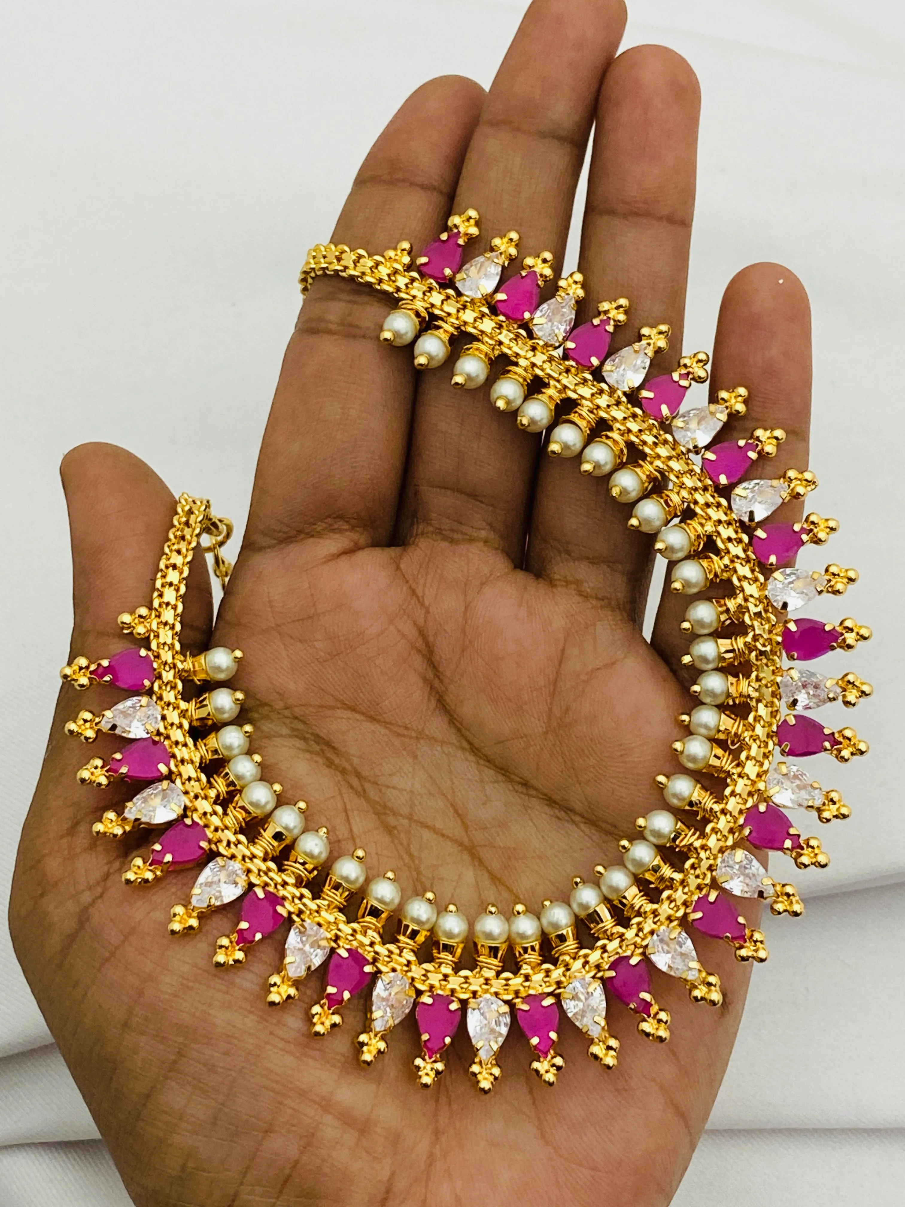 Elegant Gold Plated White With Pink Stoned Choker For Women