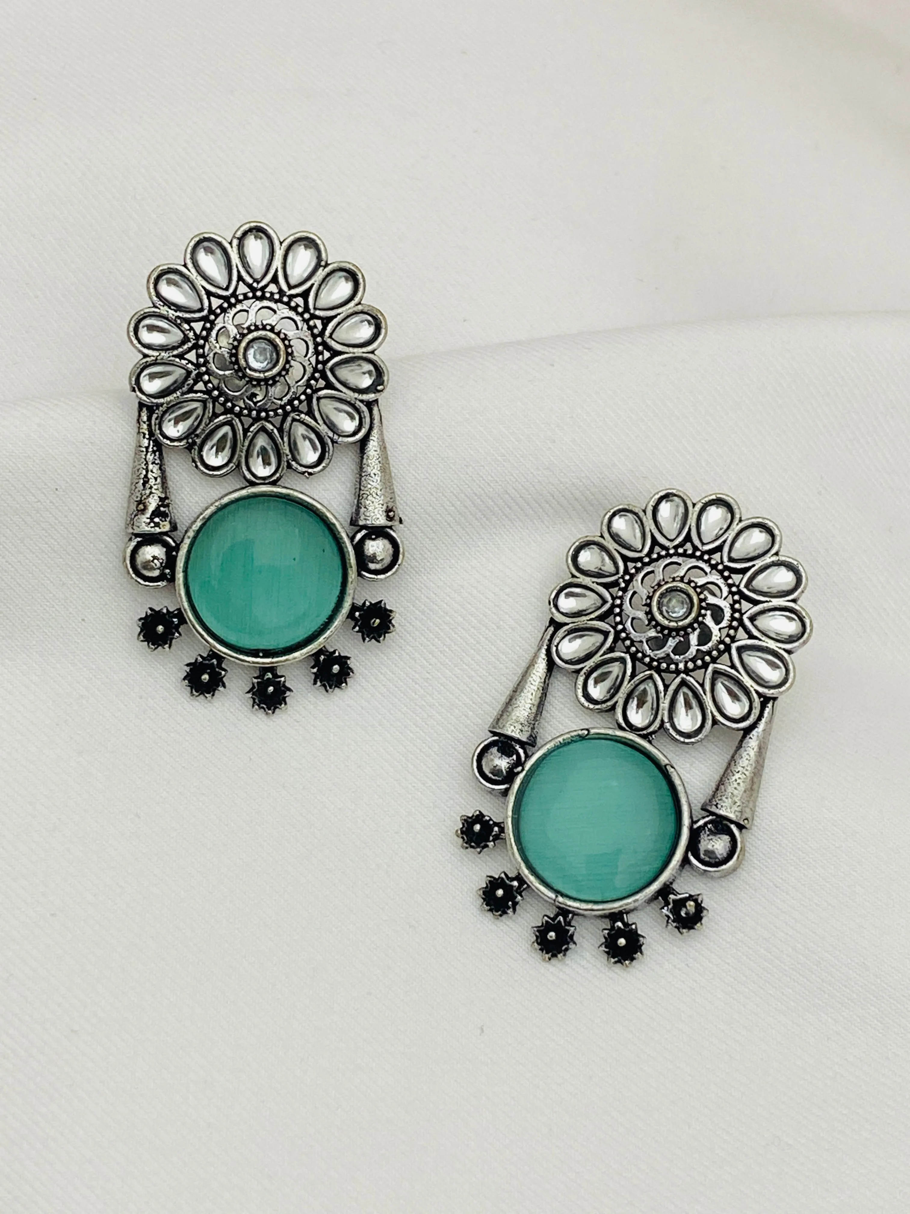 Elegant Light Blue Color Oxidized Flower And Round Designed Earrings