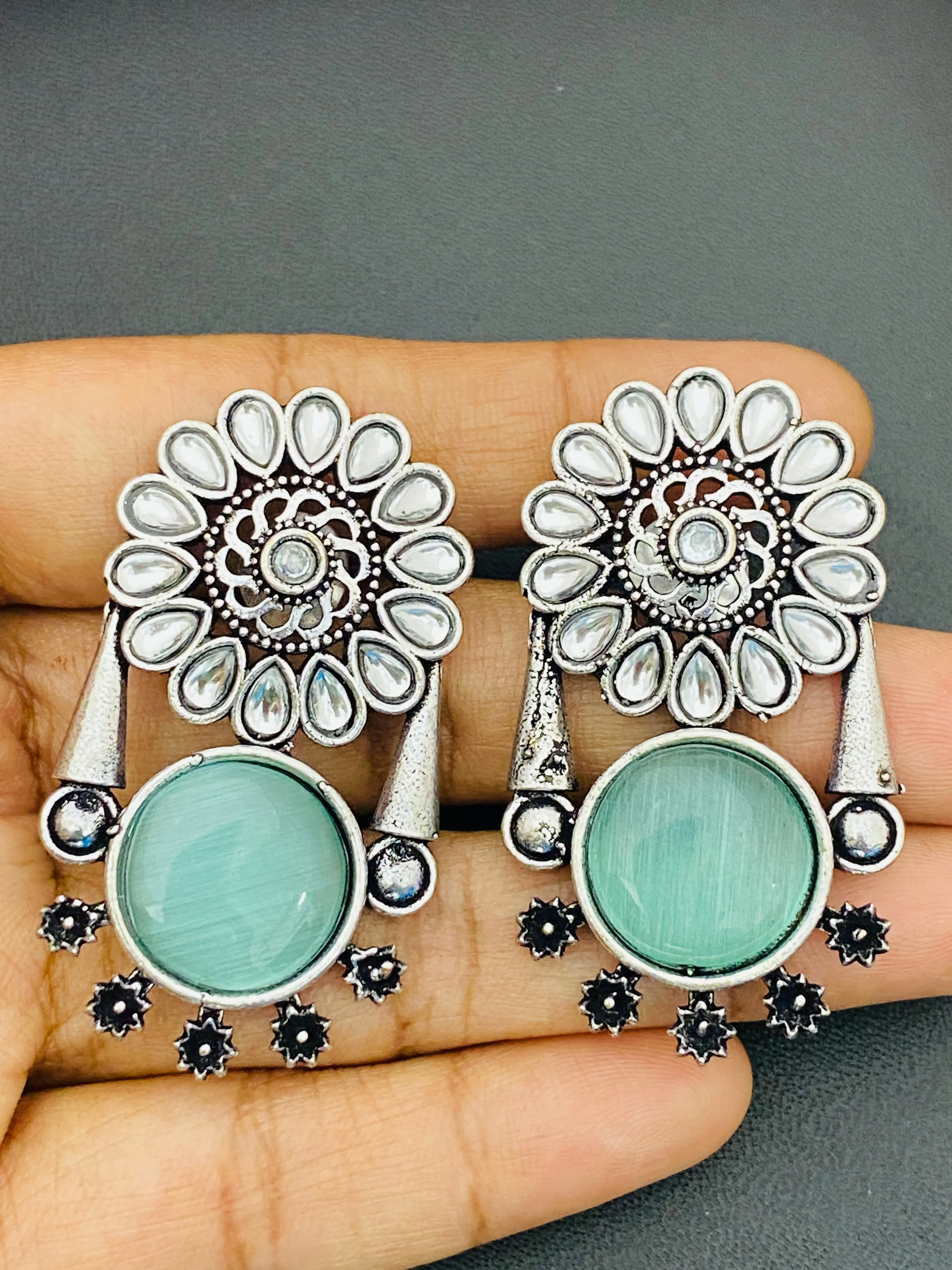 Elegant Light Blue Color Oxidized Flower And Round Designed Earrings