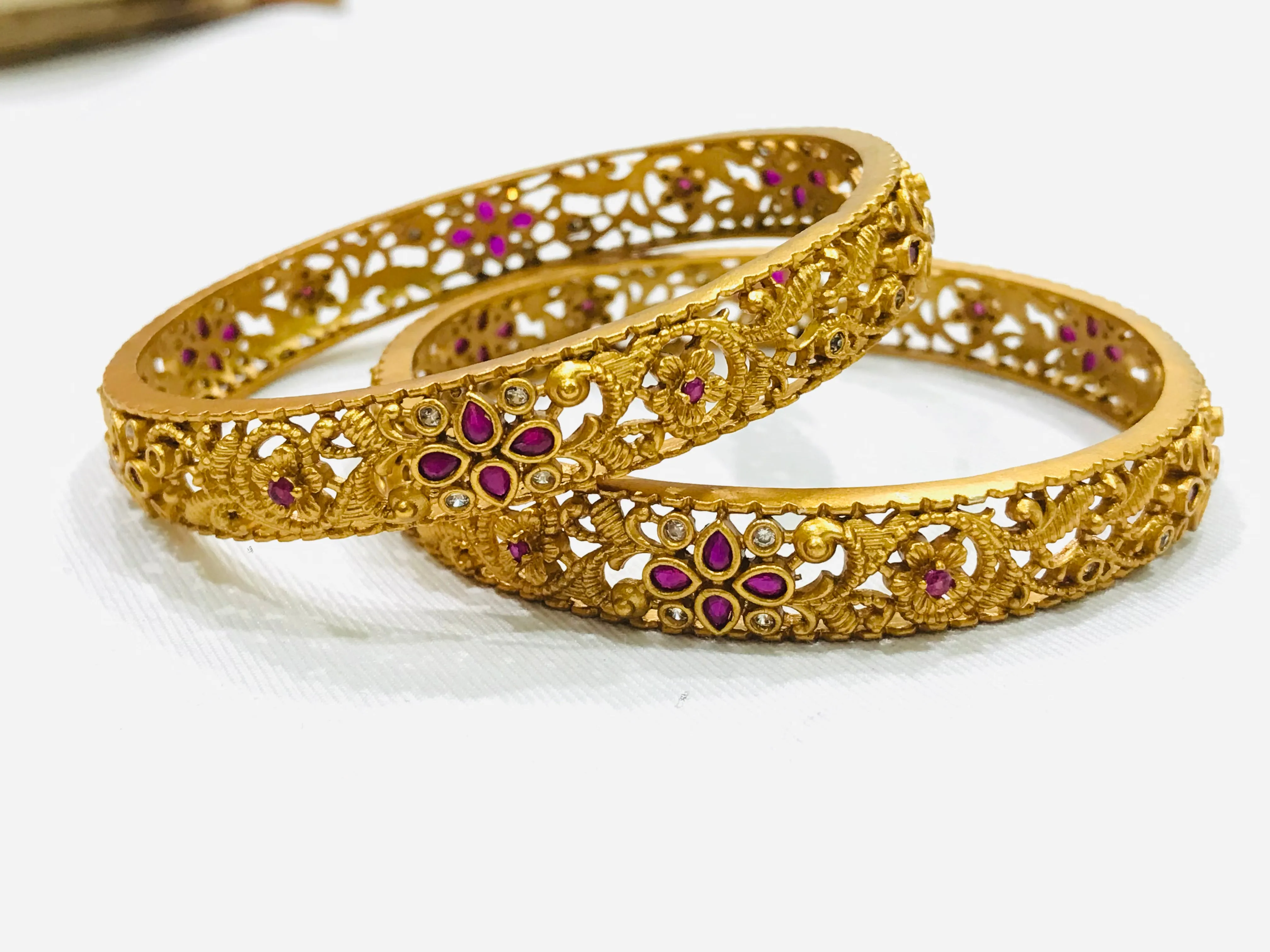 Elegant Matte Finished Antique Gold Bangle Set With Ruby Stones